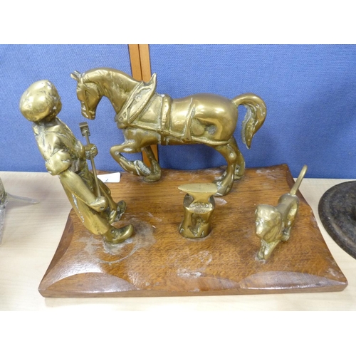 7 - Brass model of a blacksmith, set of Salter scales and a griddle.