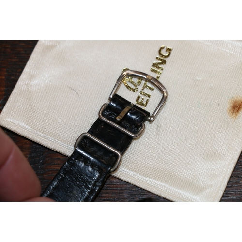 100A - Breitling wristwatch, the silvered dial with three subsidiary dials and tachymeter to the edge, 3.5c... 