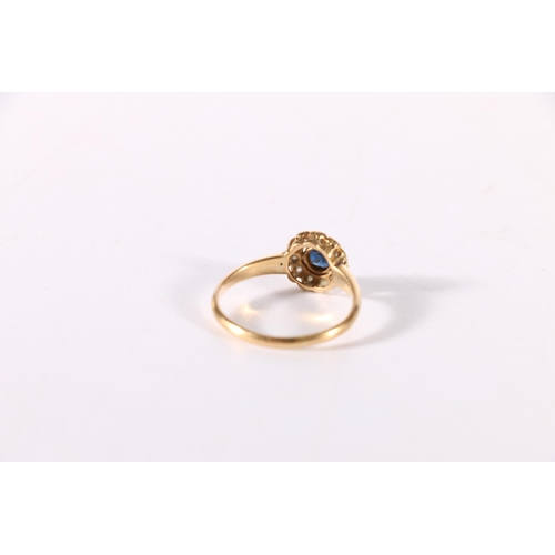 141 - 18ct gold sapphire and diamond ring, the stones arranged as a flowerhead, ring size R, 3.2g