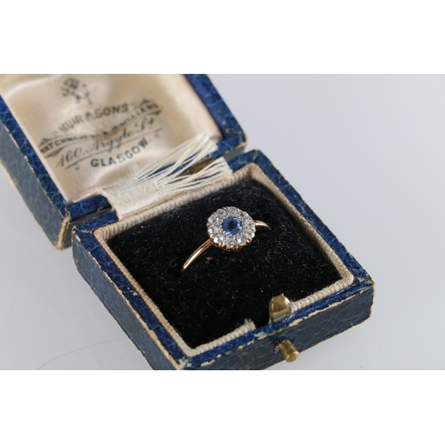 151 - Antique unhallmarked gold sapphire and diamond ring, the stones arranged in a flowerhead design, rin... 