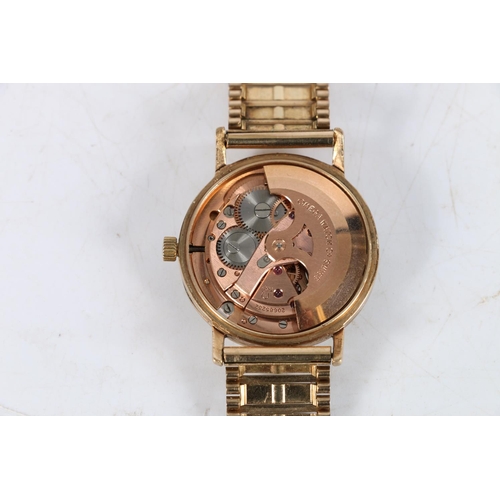 93 - Gents 9ct gold Omega wristwatch, (Cal 562), silvered dial with applied baton markers and 9ct gold br... 