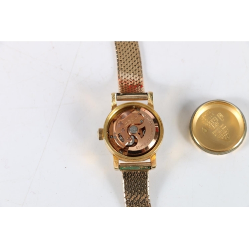 96 - Ladies 18ct gold Omega Ladymatic automatic wristwatch, (Cal 455) with 9ct gold strap.