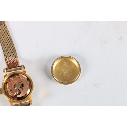 96 - Ladies 18ct gold Omega Ladymatic automatic wristwatch, (Cal 455) with 9ct gold strap.