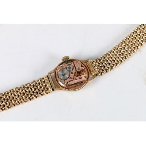97 - Ladies 9ct gold Omega wristwatch, (Cal 244), the 9ct gold strap having unusual fastening clasp. Vint... 