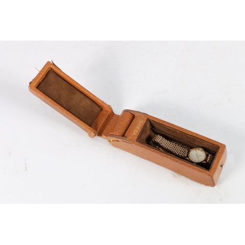 97 - Ladies 9ct gold Omega wristwatch, (Cal 244), the 9ct gold strap having unusual fastening clasp. Vint... 