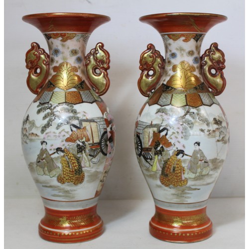 246 - Pair of Japanese Meiji period Kutani vases of twin handled baluster form with panels depicting geish... 