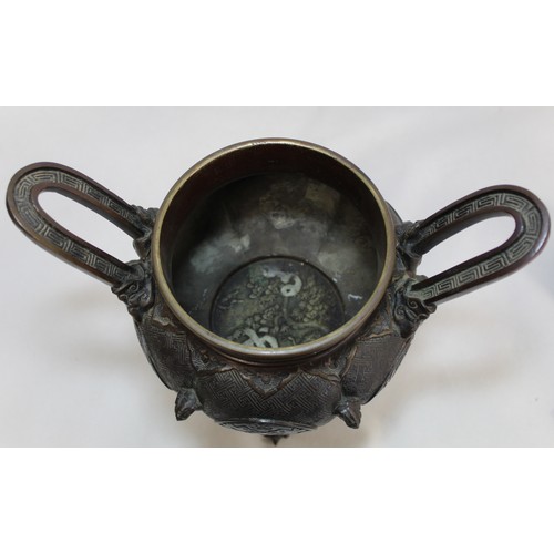 247 - Large Japanese Meiji period bronze Koro of twin handled lobed globular form with archaic circular pa... 