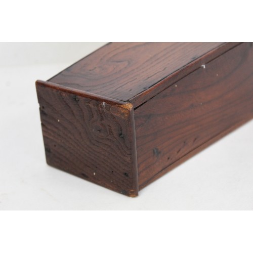 205 - Georgian elm hanging candle box of tapered rectangular form with arched pierced box, sloping hinged ... 