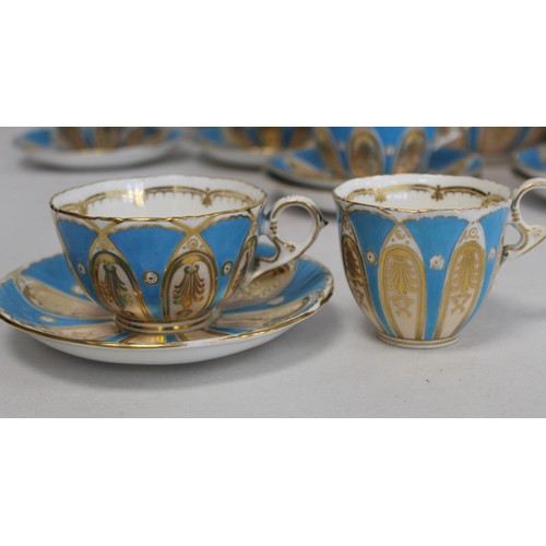 218 - Victorian English porcelain part teaset with café au lait, white and gilt elliptical panels on a tur... 