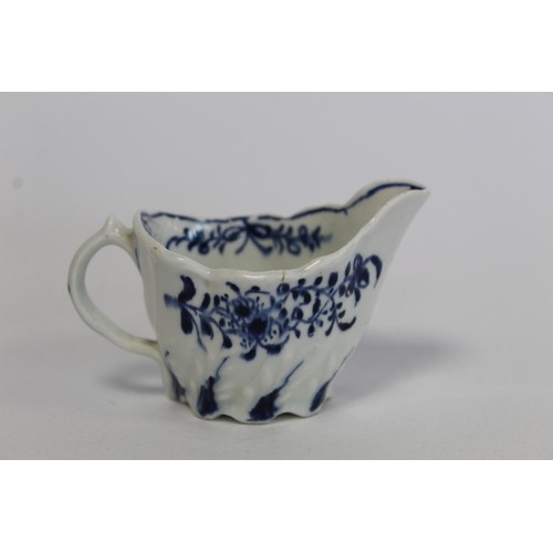 219 - Lowestoft porcelain cream boat c.1764 of low Chelsea ewer form with underglaze blue decoration of da... 