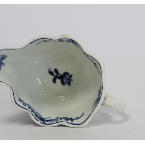 219 - Lowestoft porcelain cream boat c.1764 of low Chelsea ewer form with underglaze blue decoration of da... 