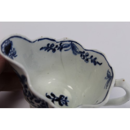 219 - Lowestoft porcelain cream boat c.1764 of low Chelsea ewer form with underglaze blue decoration of da... 