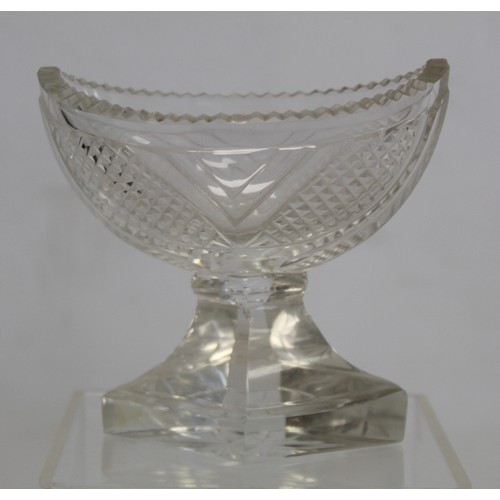 224 - Antique cut glass twin handled oval dish, probably Irish, 22cm long on matching stand; a cut glass s... 