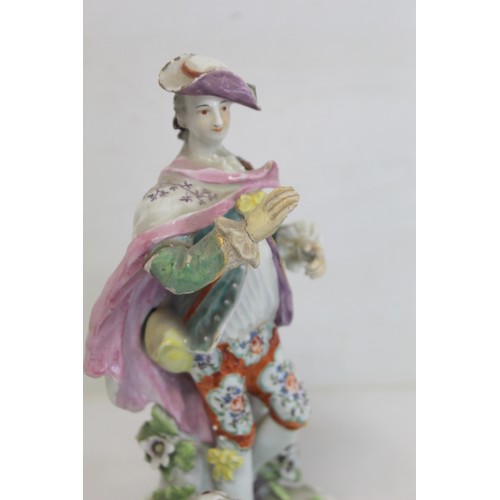 225 - Two 18th century Derby porcelain figures, one of a gentleman with dog at foot, 22cm high, the other ... 