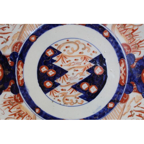 228 - Large Japanese Meiji period Imari charger of circular form decorated with panels of phoenix and hare... 