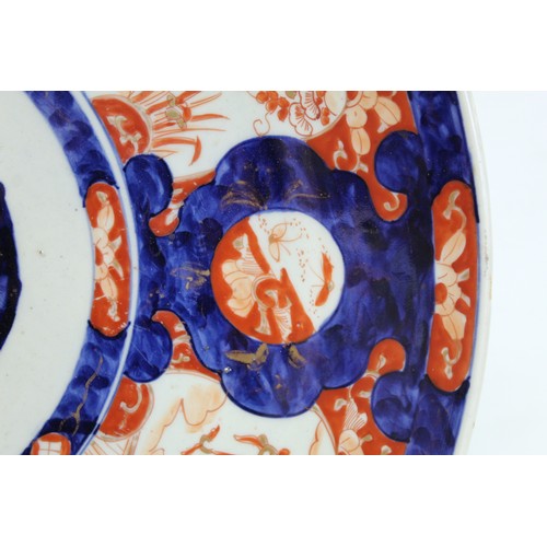 228 - Large Japanese Meiji period Imari charger of circular form decorated with panels of phoenix and hare... 