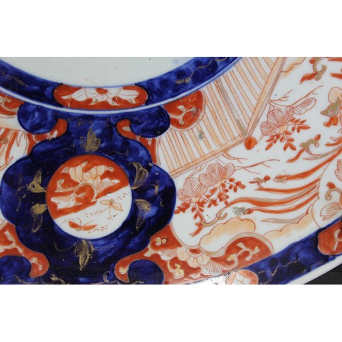 228 - Large Japanese Meiji period Imari charger of circular form decorated with panels of phoenix and hare... 