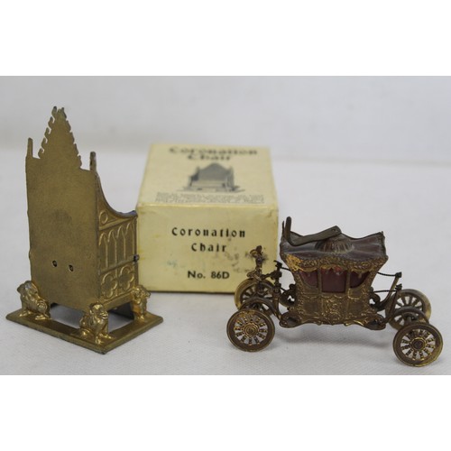 230 - Commemorative ware Britain's model of the Coronation Chair No. 86D, 8.5cm high, boxed; also a tape m... 