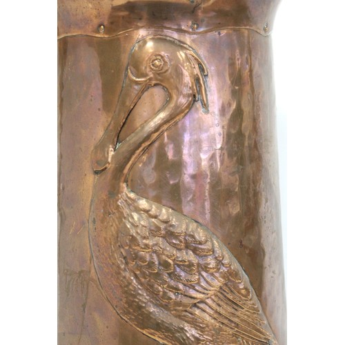 234 - Arts & Crafts copper stick stand in the manner of Newlyn School, decorated with a pelican, fish ... 