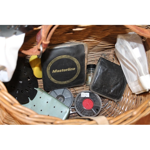 113 - Wicker fishing basket containing fishing tackle including fly wallets, etc.&nbsp;