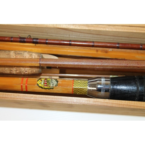 128 - Vintage split cane fishing rods in wooden case