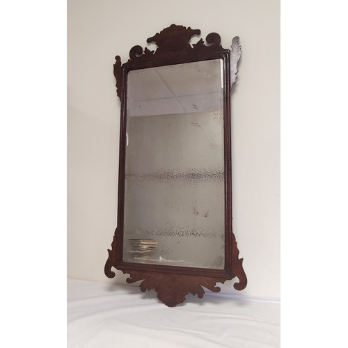 619 - Georgian mahogany fret frame wall mirror, shaped top, bevelled plate and moulded frame. 105cm