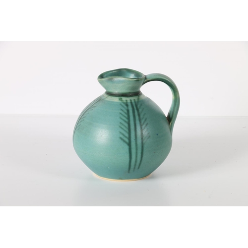 16 - Hella Young of Tayport studio pottery jug, signed to base, 15cm tall.