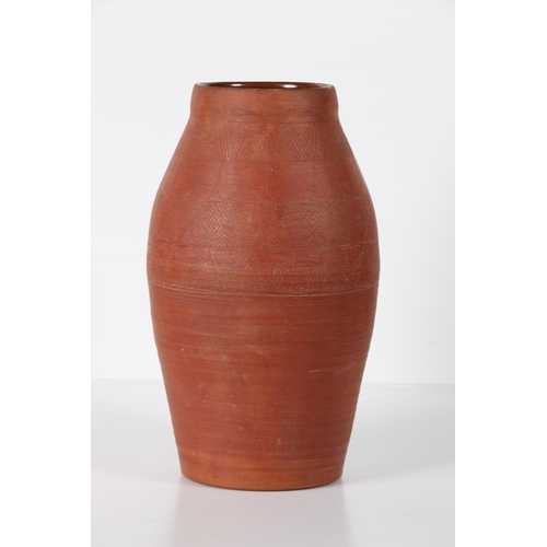 21 - Sgraffito decorated terracotta vase, 27cm tall.