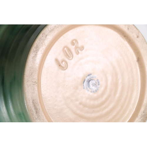 34 - George Jones & Sons Crescent China jug in the manner of Charlotte Rhead, 28cm tall.