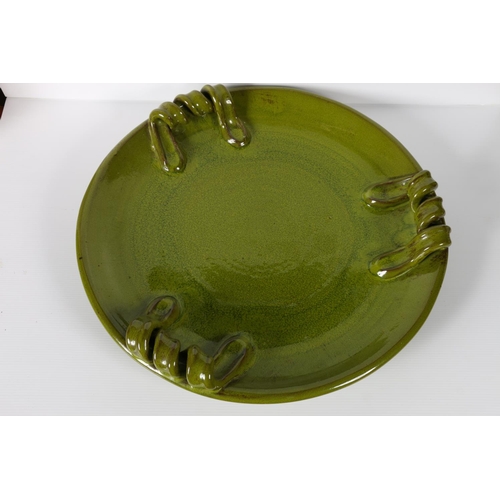 38 - A large pottery triple scroll handled charger dish, 45cm diameter.&nbsp;