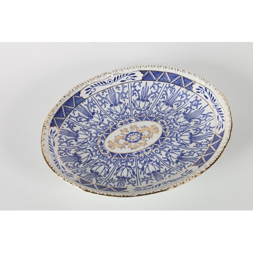 40b - 1920's A J Harley Jones Wilton Lily tazza, decorated with blue and gilt Morris inspired pattern on w... 