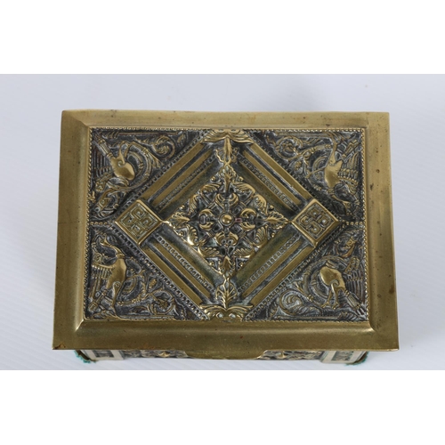 47 - Bronze or brass casket decorated with lions and peacocks, 15cm long.