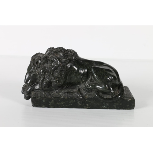 49 - Carved marble model of a resting lion, possibly the lion of Lucerne, 15cm long.&nbsp;