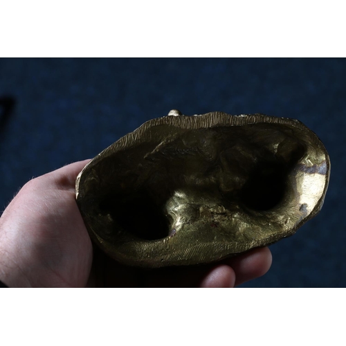 50 - Cast metal model of a girl and boy at picnic, 12cm long.