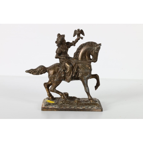 50d - Gilded metal model of a horse and rider, 18cm wide.