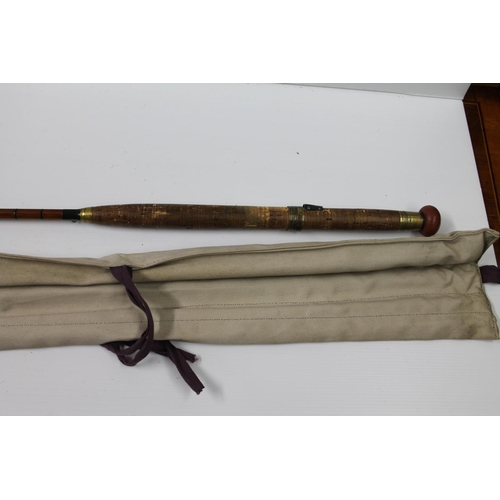 102 - J J S Walker Bampton and Co of Alnwick 11ft 2in three section split cane fishing rod 