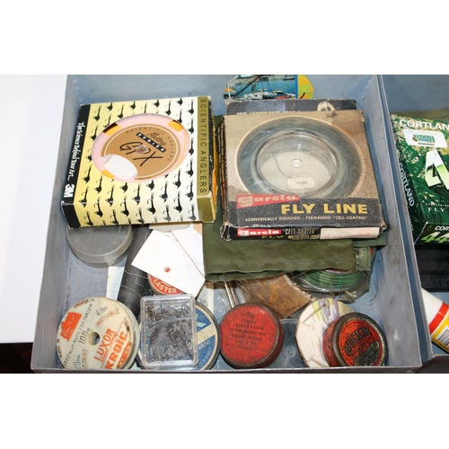 115 - White metal box containing fishing tackle including two leather and canvas fishing bags, a priest, l... 