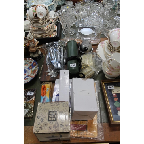 238 - Keyrings, a cordless mixer/blender, a door lock, a camping lantern, etc.