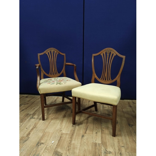 613 - Hepplewhite style mahogany elbow chair with matching side chair, shield shaped top above a wheatshea... 