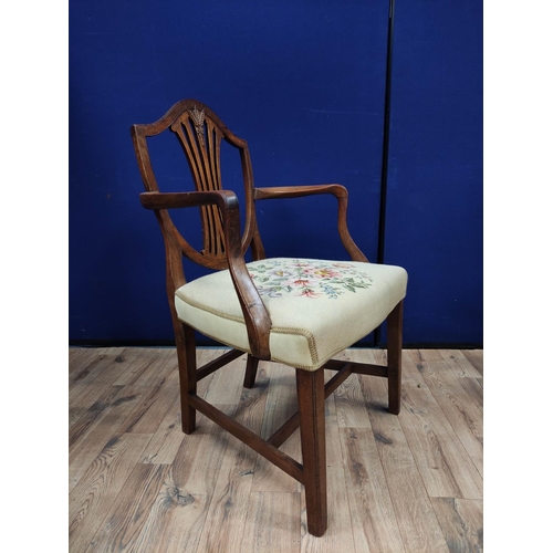 613 - Hepplewhite style mahogany elbow chair with matching side chair, shield shaped top above a wheatshea... 