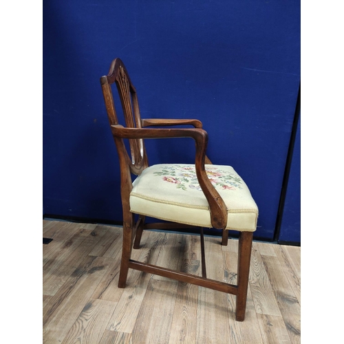 613 - Hepplewhite style mahogany elbow chair with matching side chair, shield shaped top above a wheatshea... 