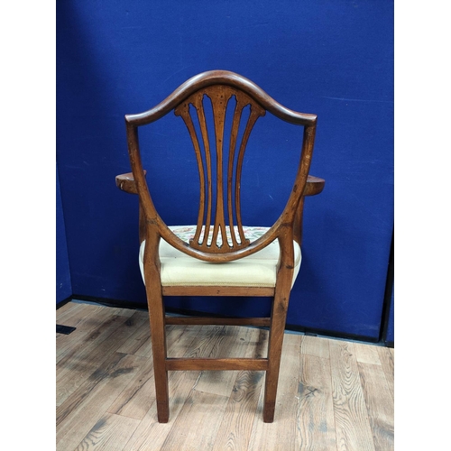 613 - Hepplewhite style mahogany elbow chair with matching side chair, shield shaped top above a wheatshea... 