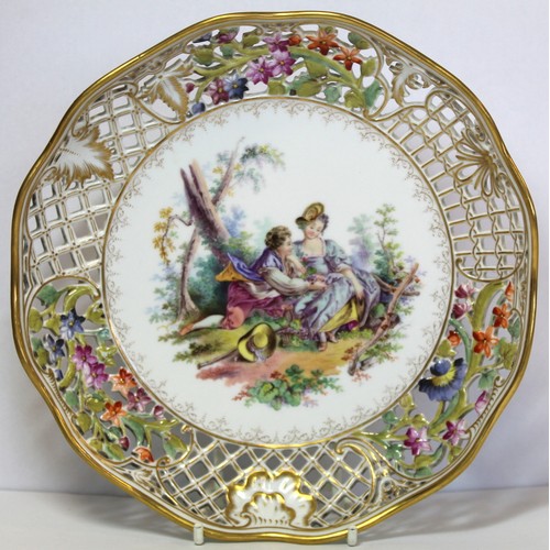 253 - Set of six late 19th/early 20th century German porcelain plates with lobed rims, pierced floral and ... 