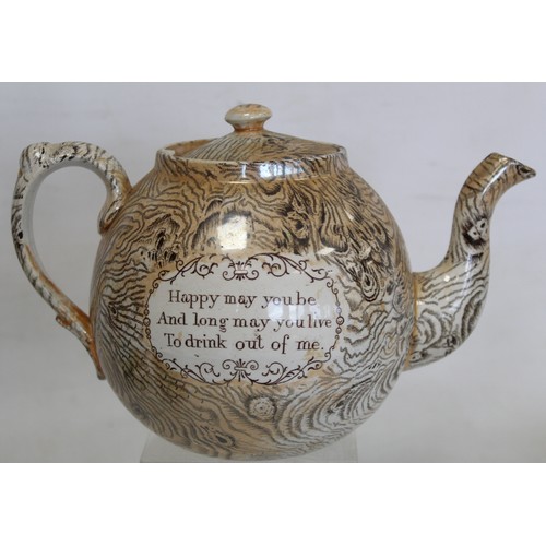 257 - 19th century lustre teapot of globular form with bark effect transfer decoration and panels of motto... 