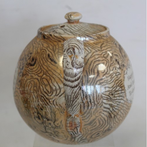 257 - 19th century lustre teapot of globular form with bark effect transfer decoration and panels of motto... 