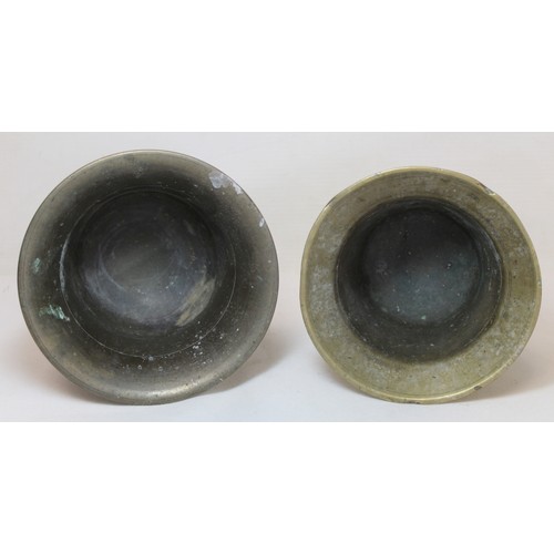 264 - Antique bronze mortar of flared circular form, 15cm diam. and another smaller, 13.5cm diam.  (2).