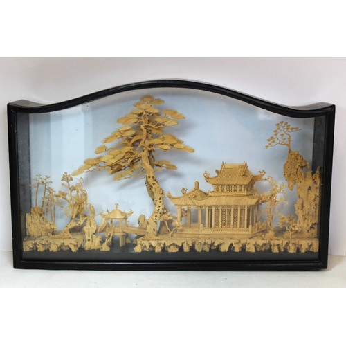 266 - Chinese carved cork diorama depicting a pavilion on a lake with trees and cranes, contained in eboni... 