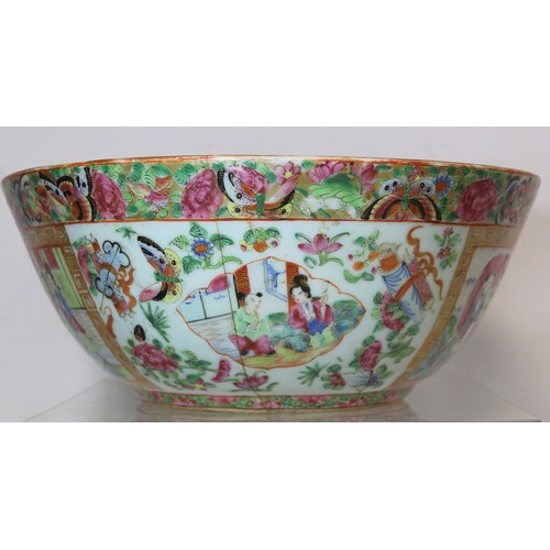 269 - 19th century Chinese Canton famille rose circular punch bowl, decorated with panels of figures on te... 