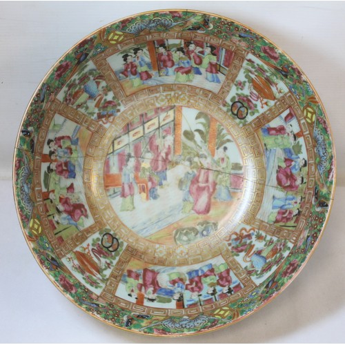 269 - 19th century Chinese Canton famille rose circular punch bowl, decorated with panels of figures on te... 