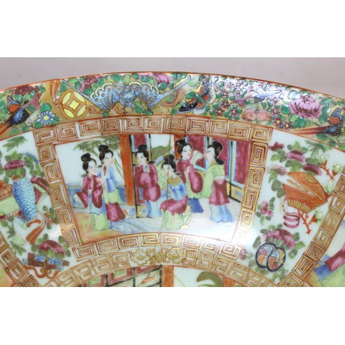 269 - 19th century Chinese Canton famille rose circular punch bowl, decorated with panels of figures on te... 